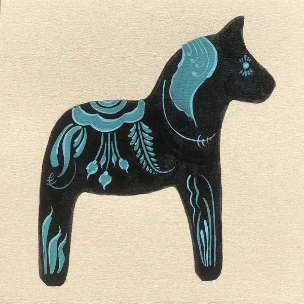 Side view of a stylized black horse with a blue mane, blue lines on its legs, and a blue saddle made of flowers and ferns and swirls.