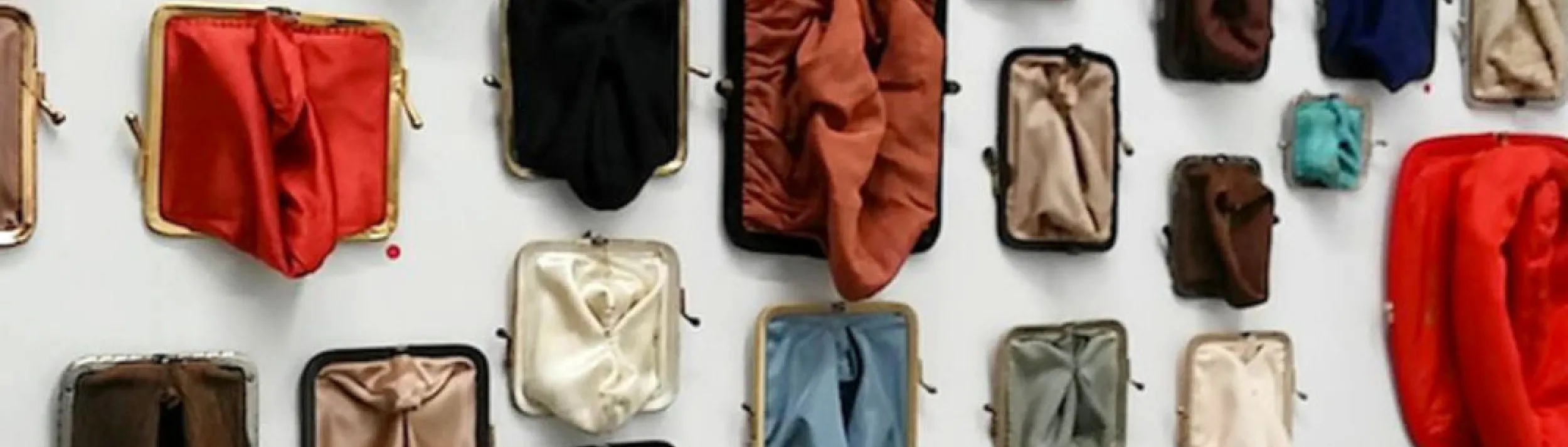 coin purses turned inside out with various sizes and colors representing female genitalia