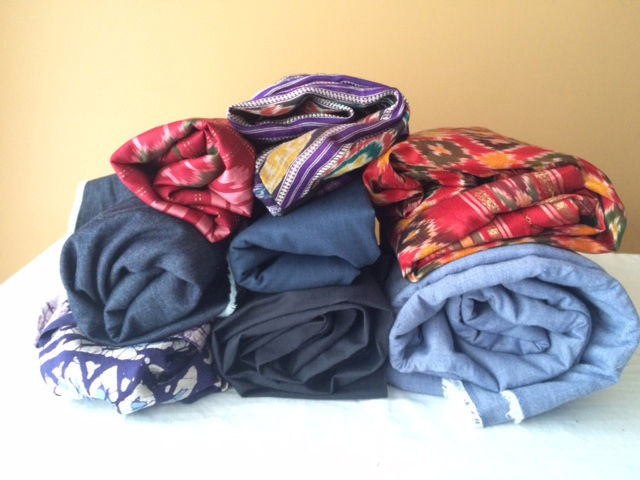 stack of various patterned fabrics
