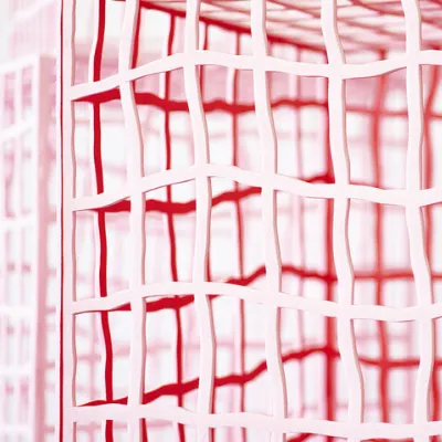 Containment Strategies," 2022, mixed media. Photo by Jeff Cords. Red/white cubes that look like cells for containment.