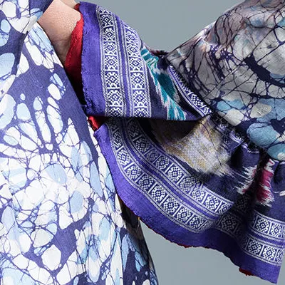 Closeup of blue and white multi-pattern dress