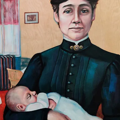 Dr. Martha Rogers Ripley (1843-1912), standing in a nursery holding a baby.
