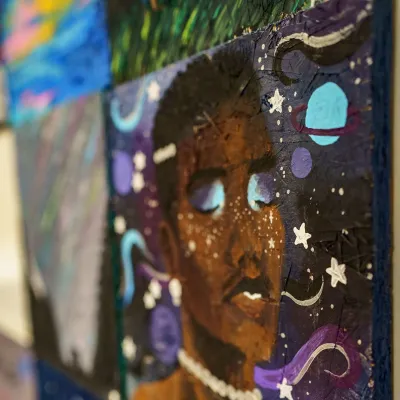 A portrait painted on a piece of Plywood.