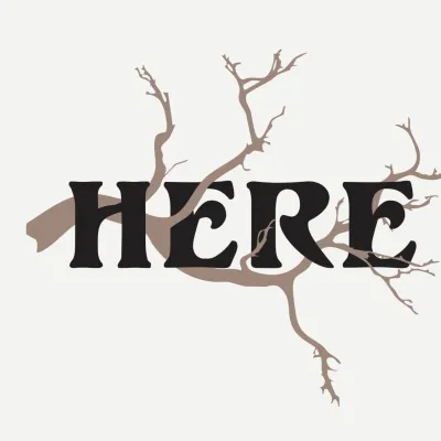 Image of a branch with the word HERE on top of it