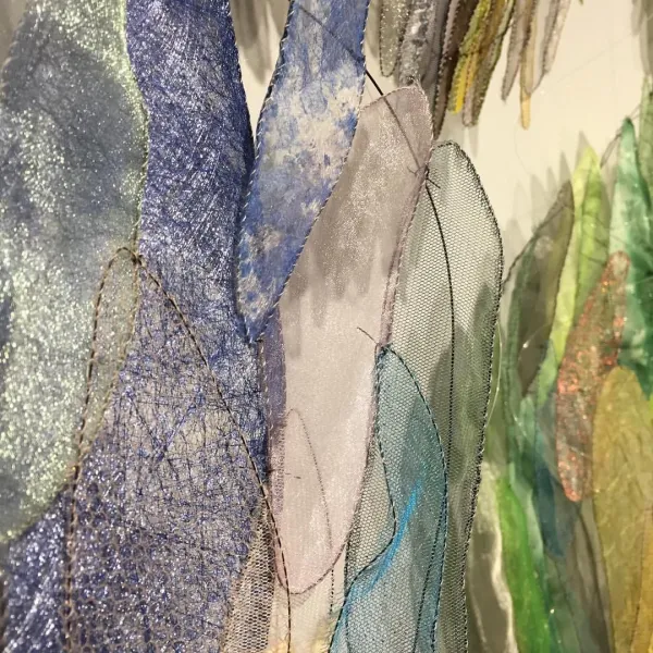 Borealis (detail), 2017, steel wire, fabric, paper, thread, digital projection and sound, 54 x 96"