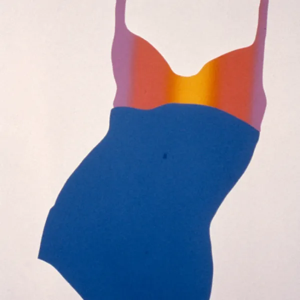 A women's one-piece bathing suit red at the top with a sun setting, and blue at the bottom.