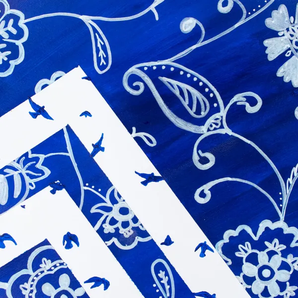 Sydney Ockenga "In Flight" (detail 2), acrylic, 5" x 7" | $50 painting of white bandanna pattern flowers on blue background, with white chevrons and birds in silhouette