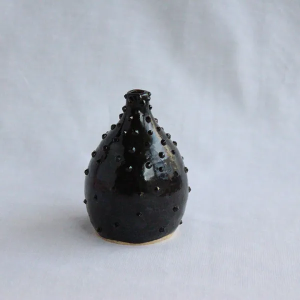 Void, 2019 | ceramic, Swarovski Crystals, 2.5 (l) x 2.5 (w) x 3.5 (h)", $55