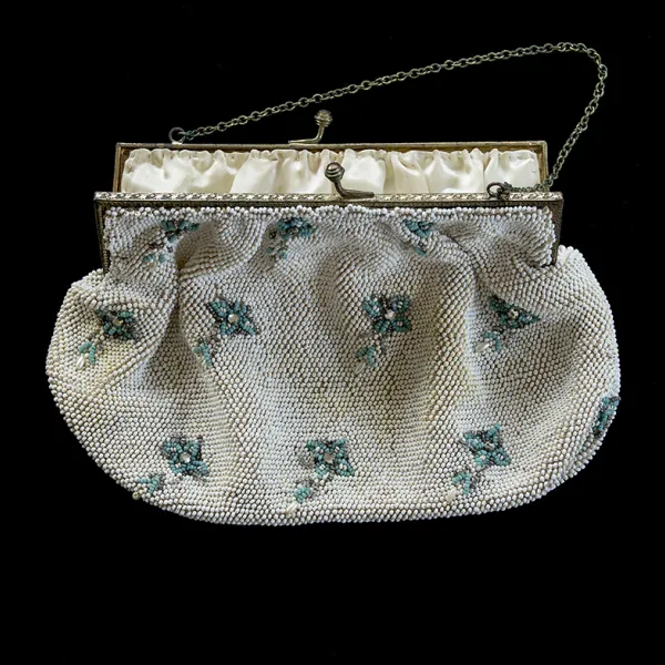 Anna’s handmade white beaded bag, turquoise flowers archival pigment inkjet print, 10.75 x 14”, 2016