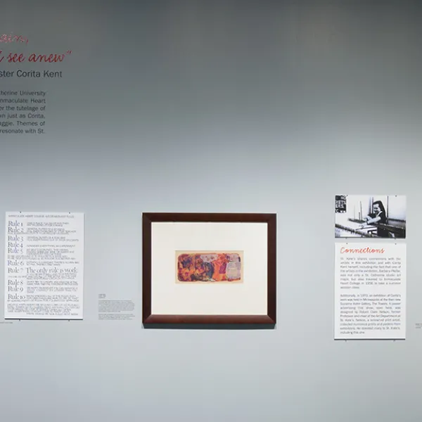 installation view ‘Rules’ posted in the Art Department at Immaculate Heart College, CENTER: Corita, tobias, screenprint,1956, St. Catherine University Permanent Collection (Accession No. 2013.0.95), LEFT: Robert Clark Nelson, C is for Corita Circus, serigraph