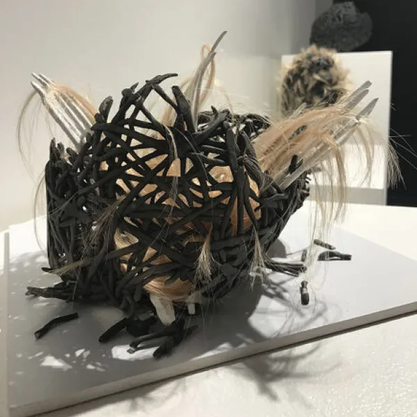 Go Forth, Raku fired ceramic, hair, 12 x 8 x 8", 2019