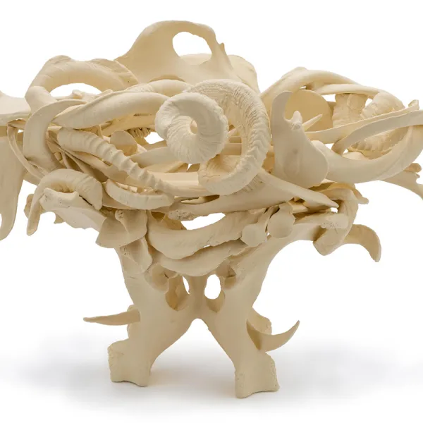 Judy Onofrio, Fruit Bowl, 2019, bones, cast bones, acrylic paint, photo credit: Rik Sferra Bowl-shaped sculpture on pedestal.