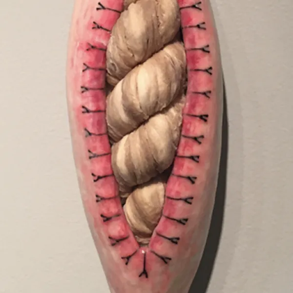 Suzanna Scott Convolution, 2016, resin, plaster, encaustic, fabric, chain, 21 x 5 x 4"