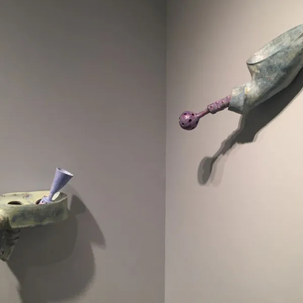 Sarah Spencer White left: Funnel/Filtered, 14 x 13 x 8", right: Expel, 11 x 17 x 8.5", 2016, earthenware