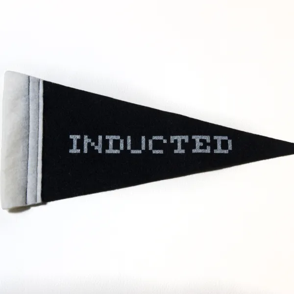 Black flag with "Inducted" written on it