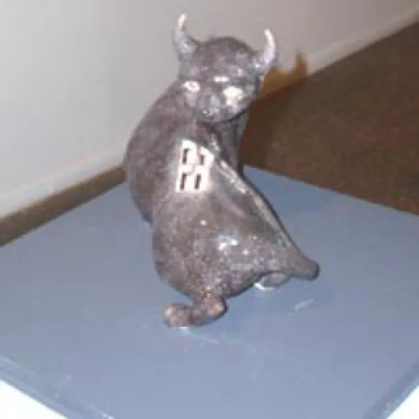 A ceramic sculpture of a bull.