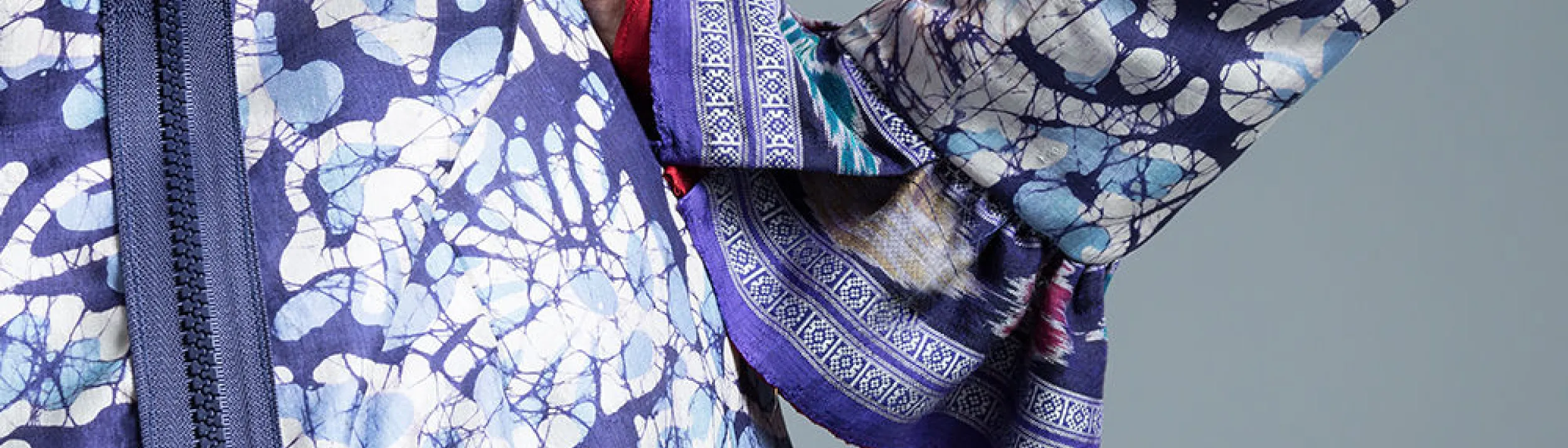 Closeup of blue and white multi-pattern dress