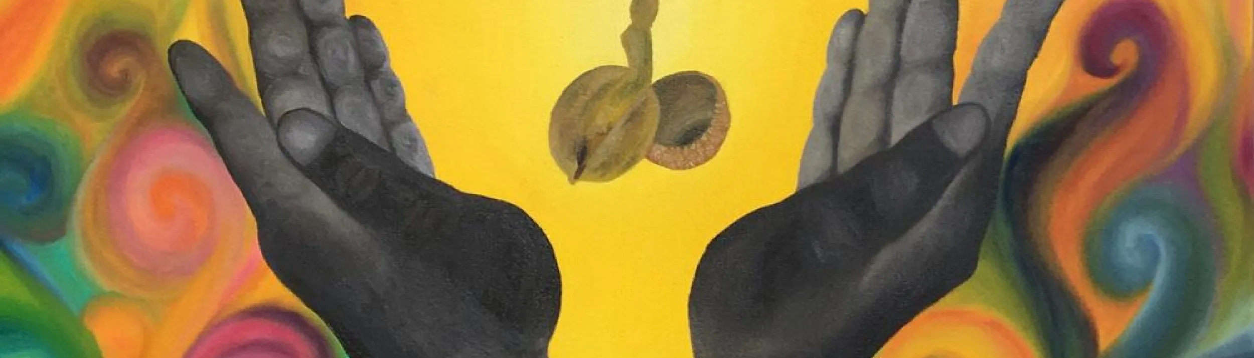 Two hands with an acorn-like item in between