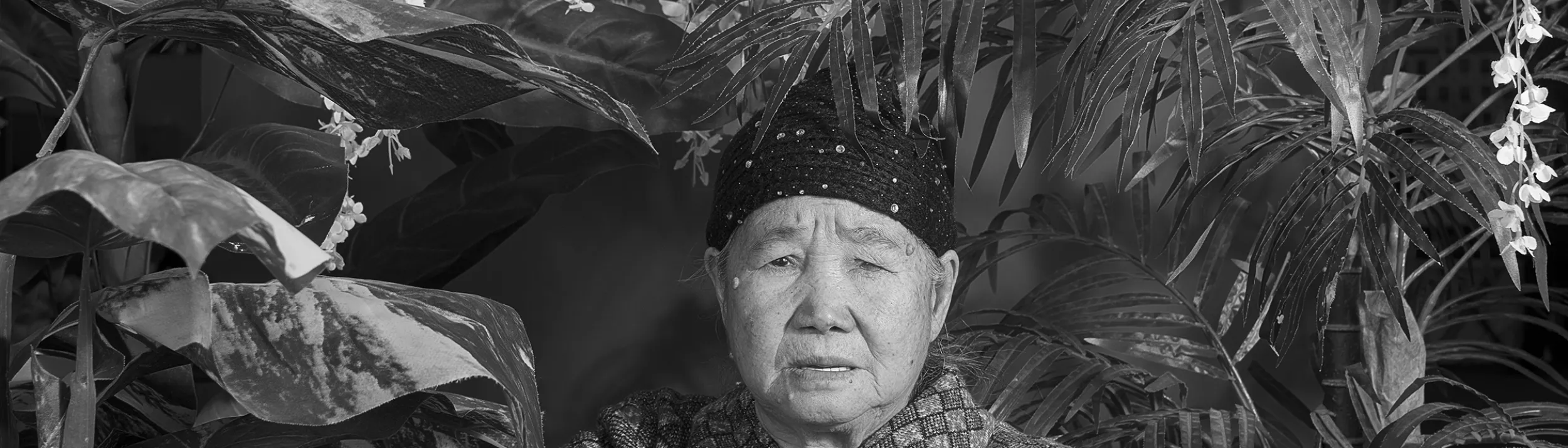 A black and white photo of a Hmong woman.