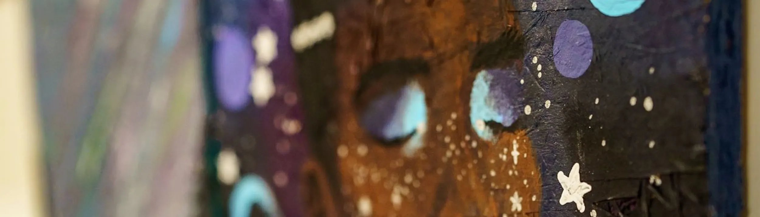 A portrait painted on a piece of Plywood.