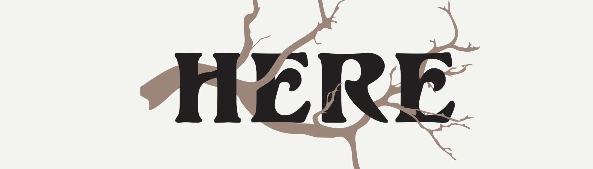 Image of a branch with the word HERE on top of it