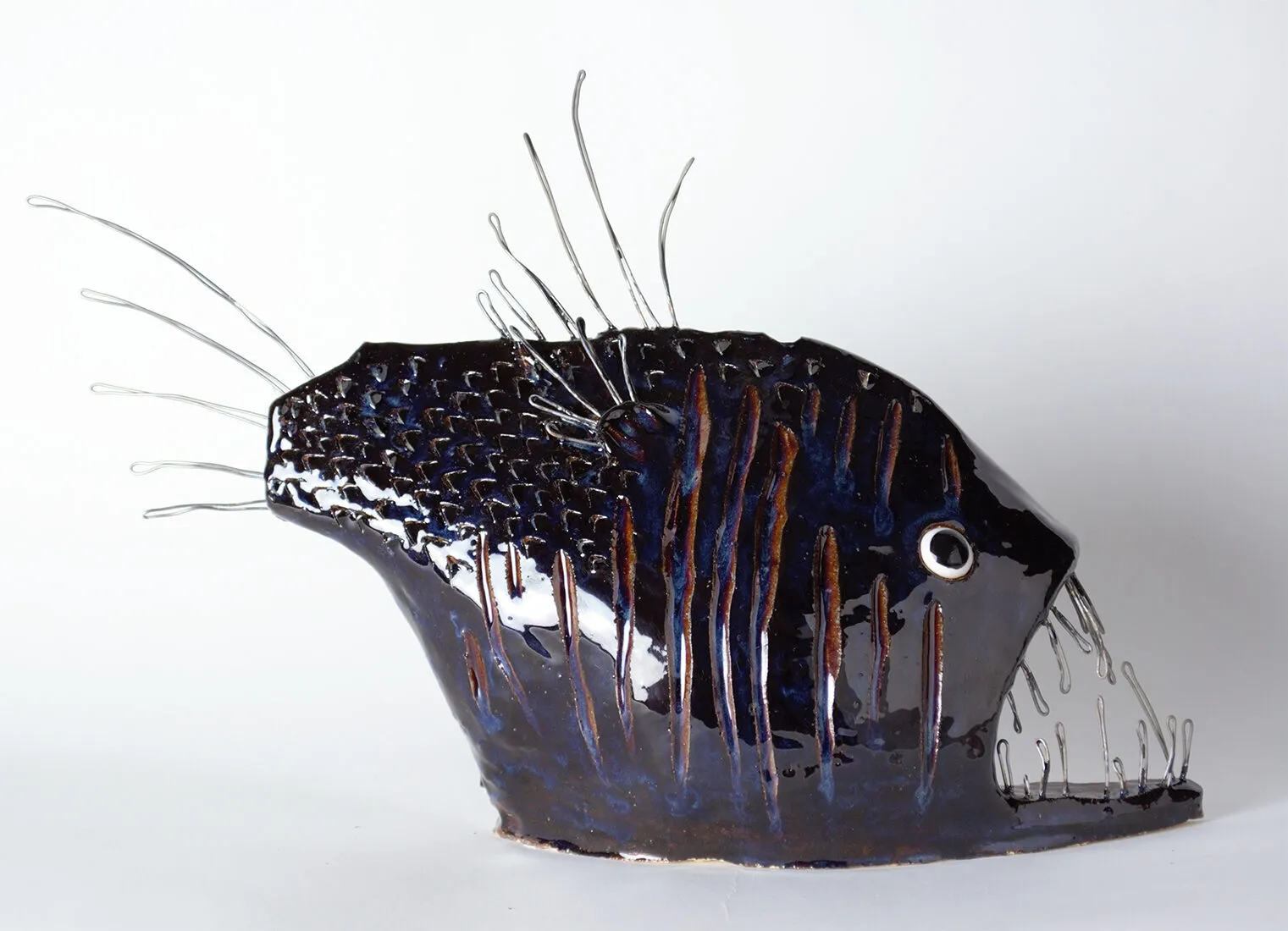 Angler fish head in mixed media and ceramic