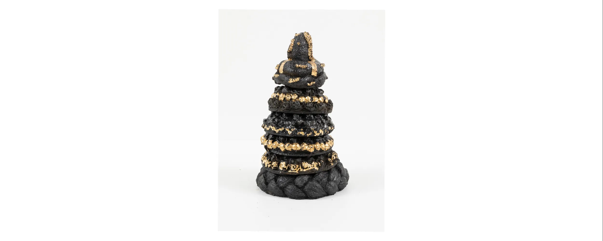 Nirmal Raja, Headweights, 2023, Cast iron and gold leaf